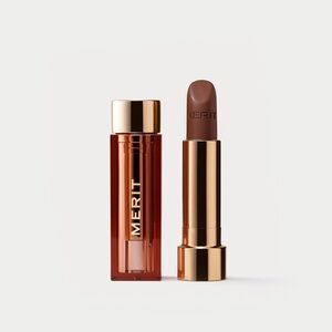 Brand new merit signature lipstick in shade 1990 with Merit makeup bag.